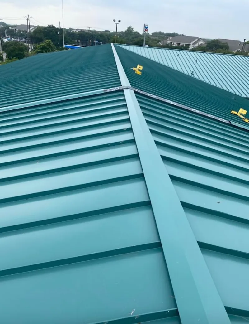 Green commercial metal roof ridge and valley for Metal Roof Repair in Upper Chichester